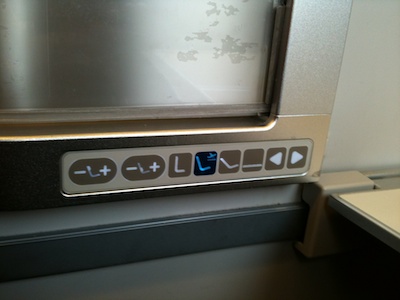 Controls for seat with highly abstracted iconography and too-clean arrangement