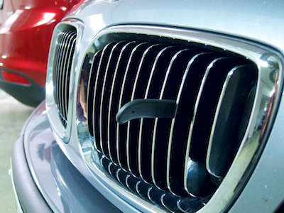 BMW car's front grille with a handle protruding from it