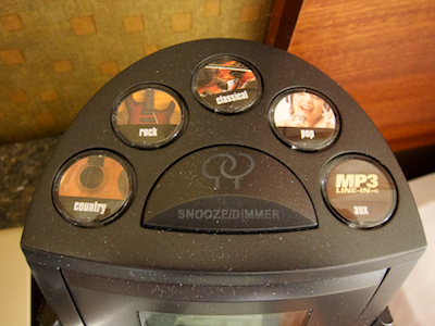 Radio station presets and snooze button on top of the clock