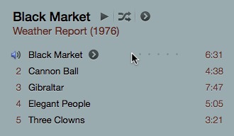 The 'greater than' icon for the new context menu appears only for the track that the mouse pointer hovers over. The same applies to the five dots that represent the track's rating until you have actually given the track one to five stars.